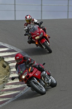 Down "The Corkscrew", Laguna Seca, CA.