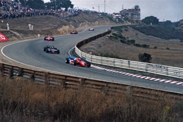 Al Unser Jr. leads through Turn 2