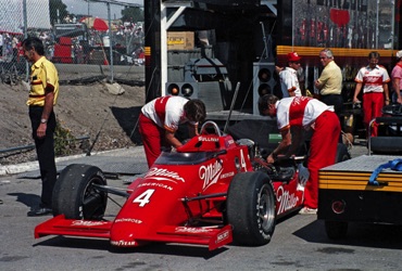 Penske crew working on Danny Sullivans's Miller entry.